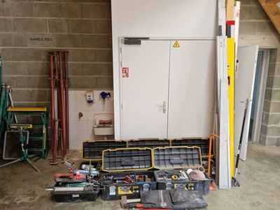 a room with a lot of tools on the floor