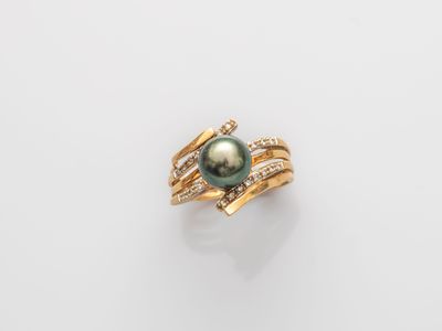 a black pearl and diamond ring