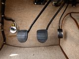 two pedals that are sitting in the back of a car