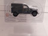 a small toy truck in a clear plastic box