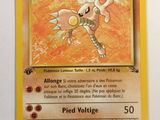a close up of a pokemon card on a white surface