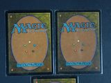 three decks of magic the gathering deck are shown on a table