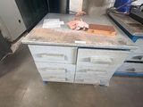 an image of a kitchen counter with a lot of boxes on top of it