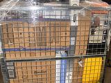 a cart full of boxes sitting in a warehouse