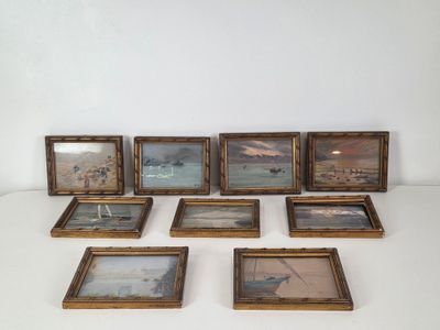 many framed pictures of boats on the water