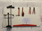 many tools that are hanging on the wall