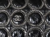 a chanel bag that is sitting on a table