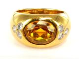 une photo d'une bague en or jaune sertie d'une citrine et de diamants