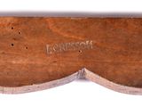 an image of a close up of a knife on a white surface