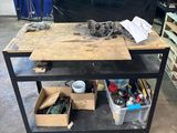 a workbench with a lot of tools on it