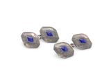 une paire de boutons de manchette en argent sertis de lapis-lazuli et de pierres bleues