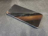 a cell phone that is laying on a table