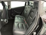 the back seats of a car are empty and the passenger seats are empty