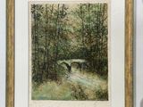 tableau encadré représentant un cerf dans une forêt