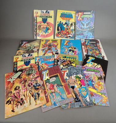a bunch of comic books sitting on top of a table