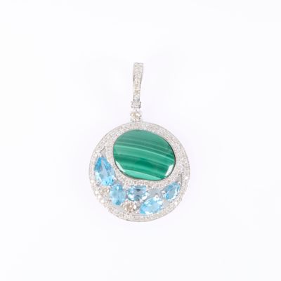 an image of a pendant with a green stone and blue topaz