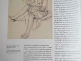 a book with a drawing of a woman sitting on a bench