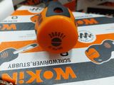 an orange and black object on top of a box
