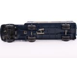 a toy truck that is sitting on a white surface
