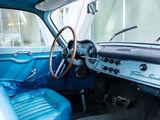 a blue and black car with a steering wheel and dashboard