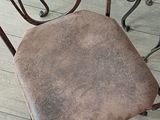 a chair that is sitting on the floor next to a table