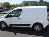 a white van that is parked in a parking lot