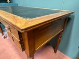a wooden table with a glass top on top of it