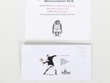 two business cards with a picture of a man throwing a baseball bat