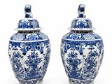 pair of chinese blue and white vases with lids