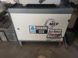 a machine that has stickers on the side of it
