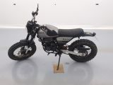 an image of a motorcycle parked on a white floor