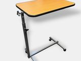 a close up of a table with a laptop on it