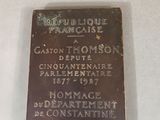 a plaque on the wall of a building in france