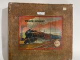 une image représentant une image d'un train sur la couverture d'un livre
