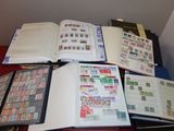 many different types of stamps on the pages of a book