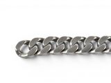 a close up of a silver chain bracelet on a white background