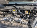 the engine of a car with its hood open and the hood open