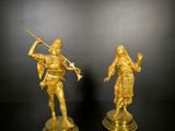 pair of antique brass figurines of a man and a woman