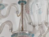 a lot of glass vases on the wall