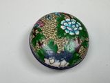a picture of a blue and white box with flowers on it