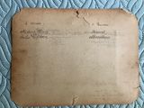 an old piece of paper sitting on top of a blue quilt