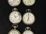 six montres de poche anciennes comportant des chiffres romains