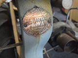 a close up view of a bike with a sticker on it