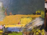 a painting that is being displayed on a easel