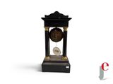 a clock that is sitting on top of a table