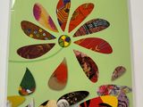 the book features an image of a flower made out of paper