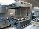 an image of a commercial kitchen with stainless steel appliances