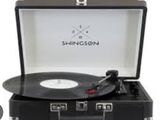 une image représentant une valise avec un tourne-disque et un tourne-disque