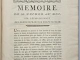 an open book with a picture of a building on it