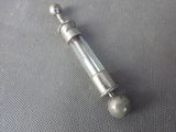 a metal object that is laying on a table